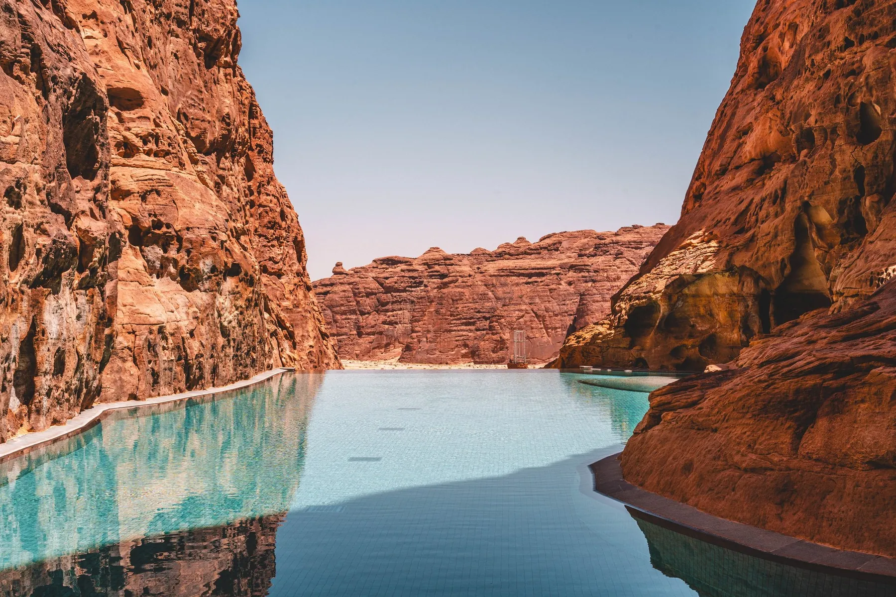 Resort pool between canyon walls